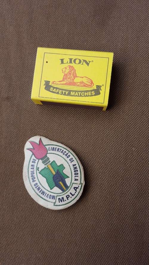 very VERY rarely seen period original MPLA pin-on plastic badge in great used condition