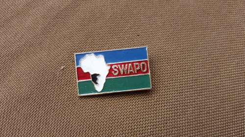 scarce period original SWAPO pin-on small metal rectangular badge in great used condition with pin