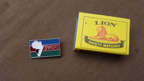 scarce period original SWAPO pin-on small metal rectangular badge in great used condition with pin