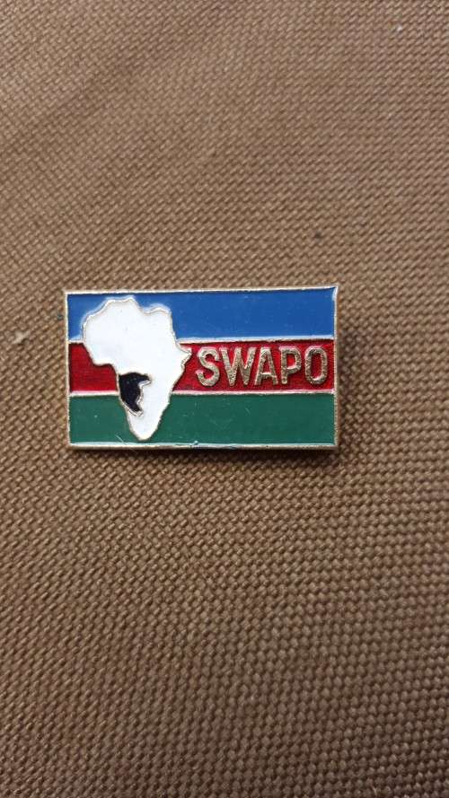 scarce period original SWAPO pin-on small metal rectangular badge in great used condition with pin