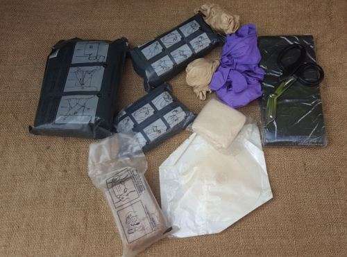 a 8 piece job-lot of GWOT era medical supplies (all timex) and suited to training use - all unused