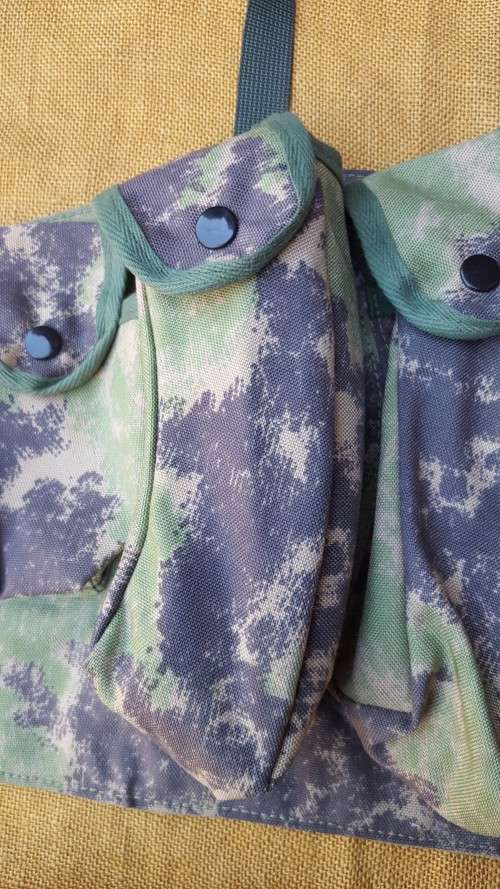 on auction a new custom made Zim splotch camo in nylon chest webbing sized for 6 AK 47 or R4/5 mags