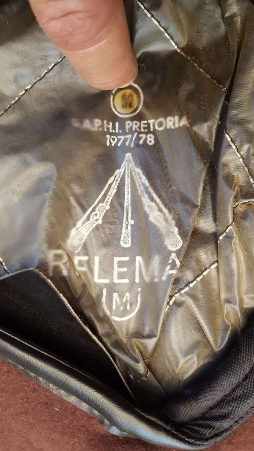 a unknown SADF era "plum" or dark brown colour wool beret dated 1977/8 - in unused good condition no