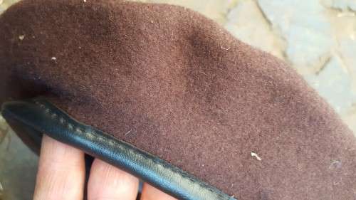 a unknown SADF era "plum" or dark brown colour wool beret dated 1977/8 - in unused good condition no
