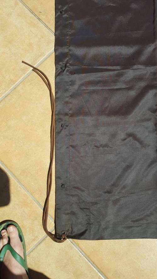 used SADF era dark nutria brown poncho almost unused no damage all strings present - water proofing