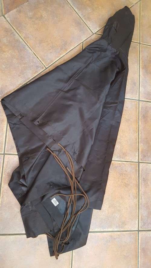 used SADF era dark nutria brown poncho almost unused no damage all strings present - water proofing