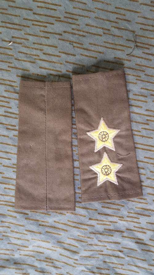 pair of unused SADF era Pvt purchase Lt officer`s rank slides in nutria for field-dress (large yello