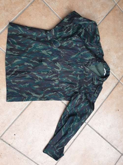 original Border war era SWAPO/PLAN used Libyan Blue camo patt l//s shirt with original Arabic label