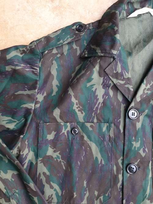original Border war era SWAPO/PLAN used Libyan Blue camo patt l//s shirt with original Arabic label