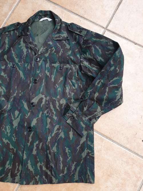 original Border war era SWAPO/PLAN used Libyan Blue camo patt l//s shirt with original Arabic label