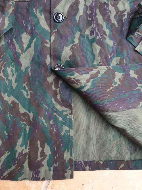 original Border war era SWAPO/PLAN used Libyan Blue camo patt l//s shirt with original Arabic label