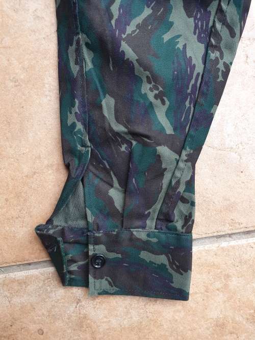 original Border war era SWAPO/PLAN used Libyan Blue camo patt l//s shirt with original Arabic label