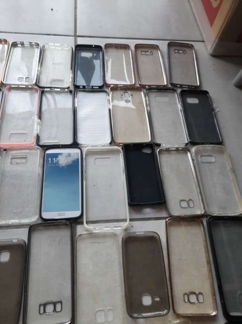 **LATE ENTRY**FREE FREIGHT FRIDAY**BULK LOT OF 100 CELL PHONE COVERS**MIXED LOT NOT IN PACKAGING****