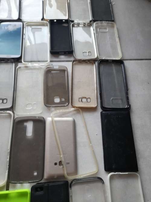 **LATE ENTRY**FREE FREIGHT FRIDAY**BULK LOT OF 100 CELL PHONE COVERS**MIXED LOT NOT IN PACKAGING****