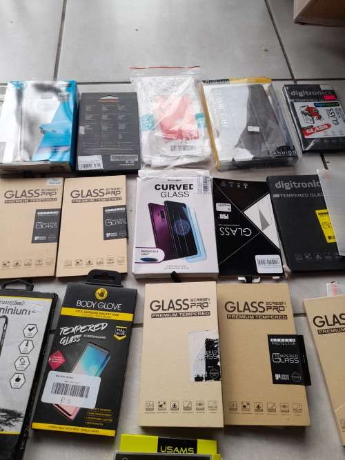 **LIQUIDATION***BULK LOT OF 60 CELL PHONE COVERS AND SCREEN PROTECTORS****OVER R10 000 RETAIL***