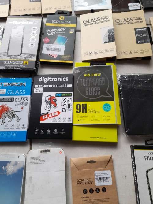 **LIQUIDATION***BULK LOT OF 60 CELL PHONE COVERS AND SCREEN PROTECTORS****OVER R10 000 RETAIL***