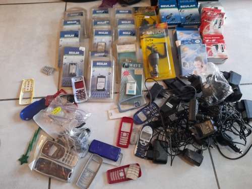**FREE FREIGHT FRIDAY***BULK LOT OF PONE, CHARGERS, BATTERIES,OLD PHONE COVERS ETC*******
