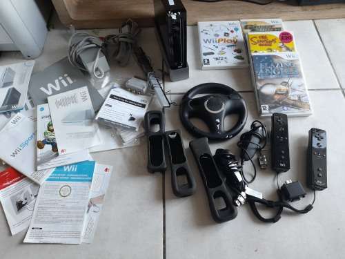 **SNAP FRI DEAL**NINTENDO WII STAND ,REMOTES,NUNCHUCKS,REMOTE GLOVES, GAMES, CABLES, ETC*******