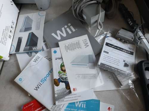 **SNAP FRI DEAL**NINTENDO WII STAND ,REMOTES,NUNCHUCKS,REMOTE GLOVES, GAMES, CABLES, ETC*******
