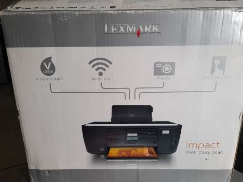 ** LEXMARK IMPACT s301 WIFI, 3 IN 1 PRINTER IN BOX WITh DISK AND MANUALS**TURNS ON BUT NOT PRINTING*