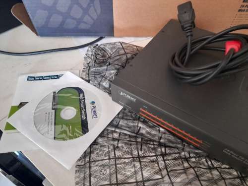 *CALLCENTRE LIQUIDATION*PLANET FNSW-2400PS 24 PORT 10/100 POE WEBSMART BUSINESS SWITCH*AROUND R15000