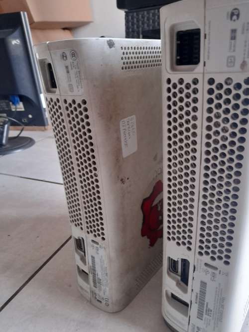 ***STORAGE CLEARANCE**2 X XBOX 360 CONSOLES*NOT TESTED NO POWER SUPPLY*ONE BID FOR BOTH**