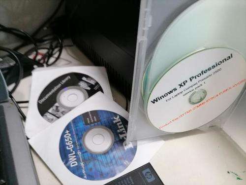 **COMPAQ PRESARIO 2500 WITH WIFI CARD,DISKS,POWER SUPPLY,BAG*OLD BUT WORKING AND BATTERY GOOD+SPARE*