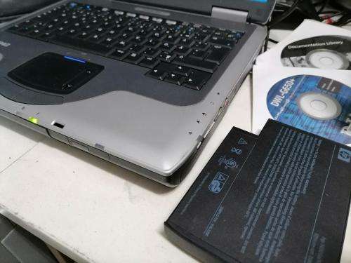 **COMPAQ PRESARIO 2500 WITH WIFI CARD,DISKS,POWER SUPPLY,BAG*OLD BUT WORKING AND BATTERY GOOD+SPARE*