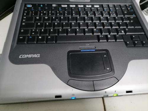 **COMPAQ PRESARIO 2500 WITH WIFI CARD,DISKS,POWER SUPPLY,BAG*OLD BUT WORKING AND BATTERY GOOD+SPARE*