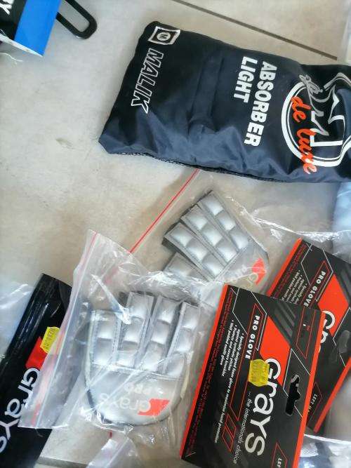 **HUGE SPORT SHOP LIQUIDATION*LOT OF BRAND NEW SHIN GUARDS,GLOVES,CRICKET PANTS ETC ETC**