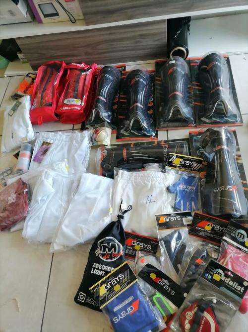 **HUGE SPORT SHOP LIQUIDATION*LOT OF BRAND NEW SHIN GUARDS,GLOVES,CRICKET PANTS ETC ETC**