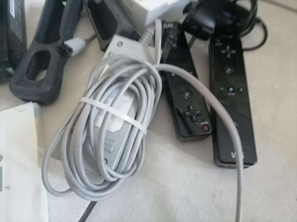 *SHOP CLOSURE*R30 FREIGHT**NINTENDO WII WITH CONSOLS,POWER CABLES,GAME ETC*POWERS ON**SOLD AS IS**