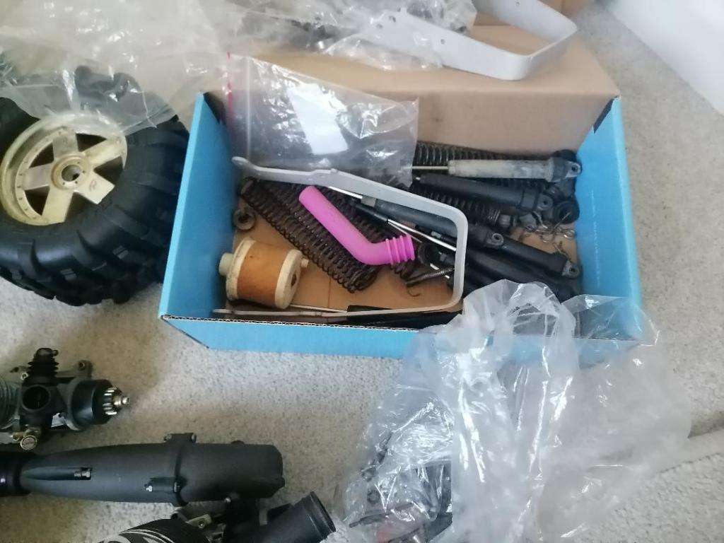 *AWESOME PROJECT*2 X HPI BIG SAVAGE NITRO TRUCKS WITH 2 MOTORS,MANY SPARES,NEW NUTS BOLTS,BEARINGS**