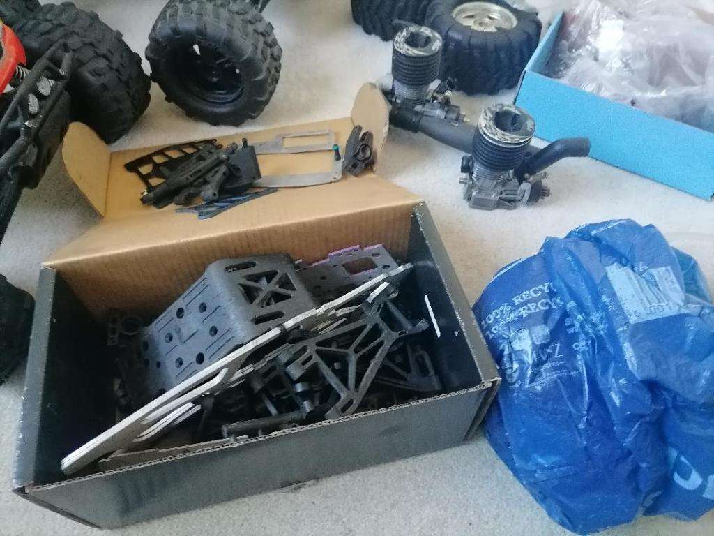 *AWESOME PROJECT*2 X HPI BIG SAVAGE NITRO TRUCKS WITH 2 MOTORS,MANY SPARES,NEW NUTS BOLTS,BEARINGS**