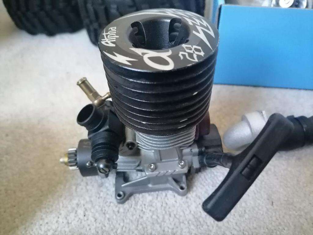 *AWESOME PROJECT*2 X HPI BIG SAVAGE NITRO TRUCKS WITH 2 MOTORS,MANY SPARES,NEW NUTS BOLTS,BEARINGS**