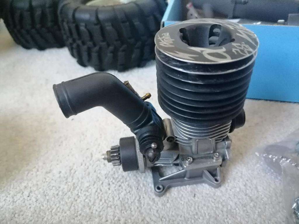 *AWESOME PROJECT*2 X HPI BIG SAVAGE NITRO TRUCKS WITH 2 MOTORS,MANY SPARES,NEW NUTS BOLTS,BEARINGS**