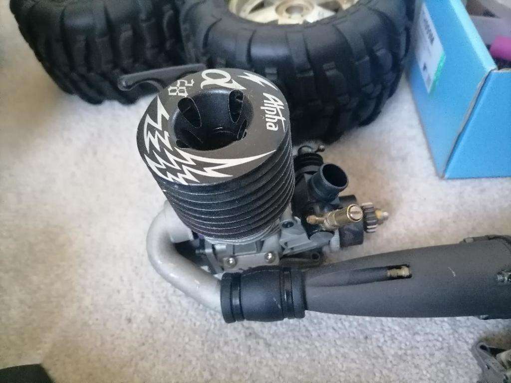 *AWESOME PROJECT*2 X HPI BIG SAVAGE NITRO TRUCKS WITH 2 MOTORS,MANY SPARES,NEW NUTS BOLTS,BEARINGS**