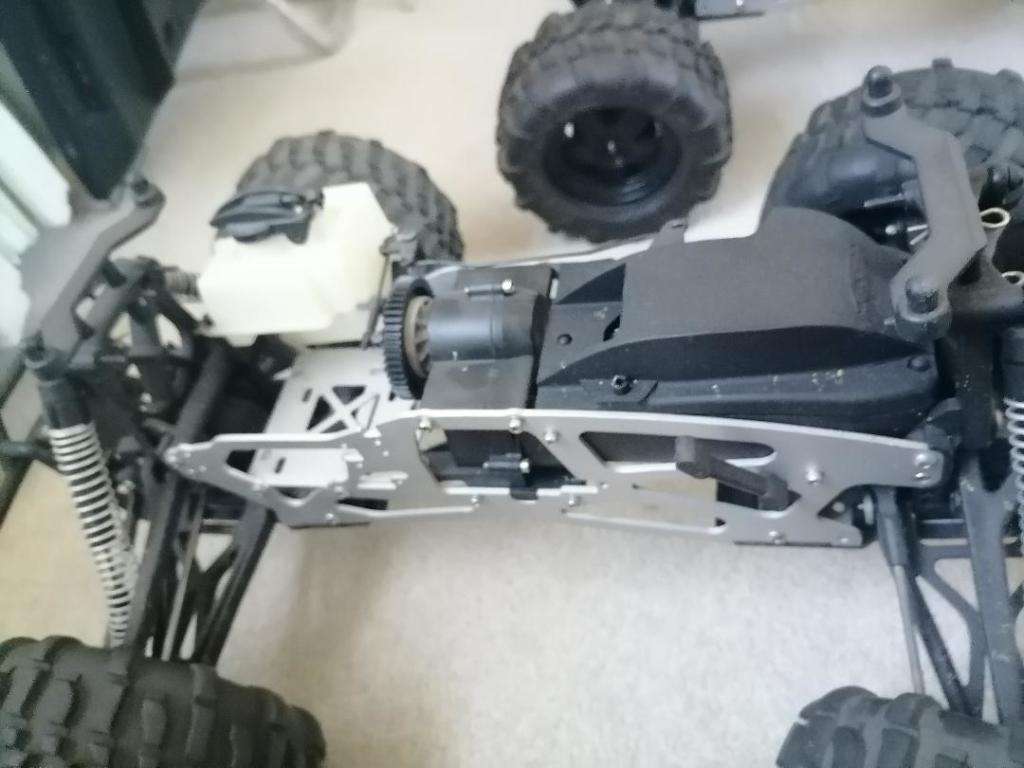 *AWESOME PROJECT*2 X HPI BIG SAVAGE NITRO TRUCKS WITH 2 MOTORS,MANY SPARES,NEW NUTS BOLTS,BEARINGS**