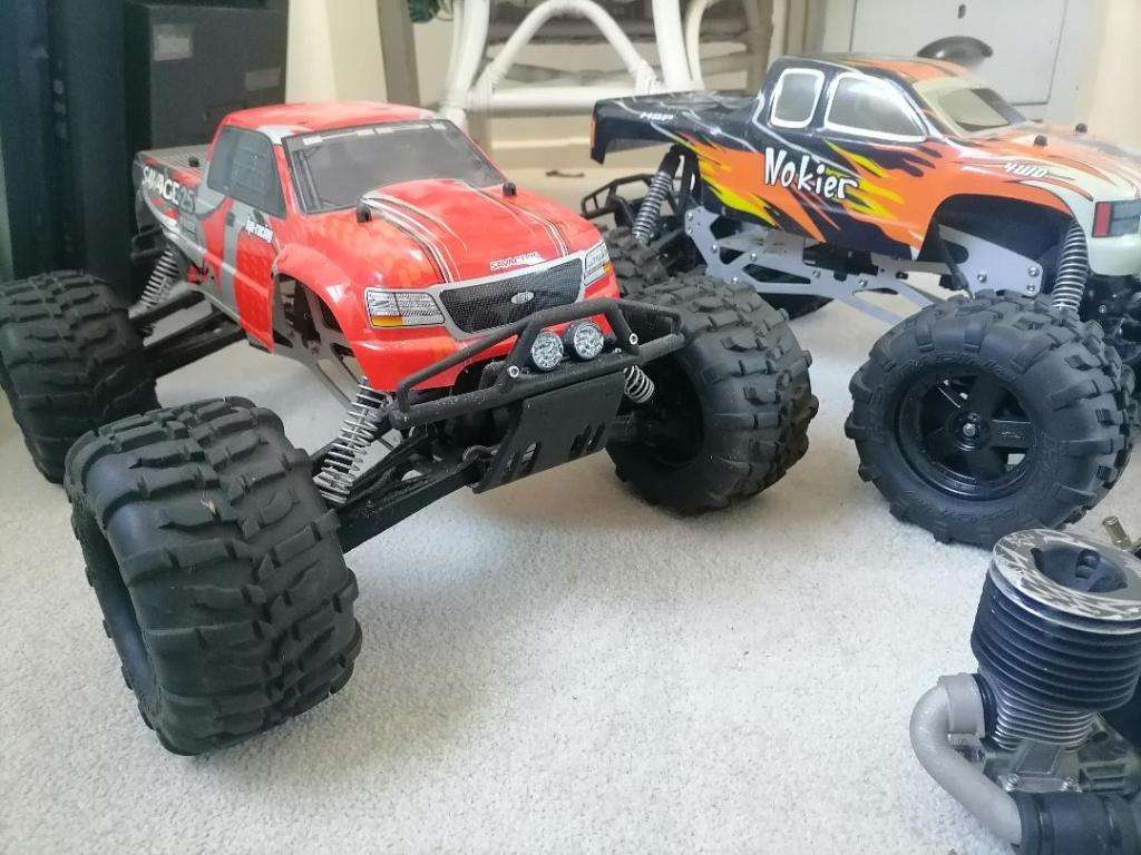 *AWESOME PROJECT*2 X HPI BIG SAVAGE NITRO TRUCKS WITH 2 MOTORS,MANY SPARES,NEW NUTS BOLTS,BEARINGS**