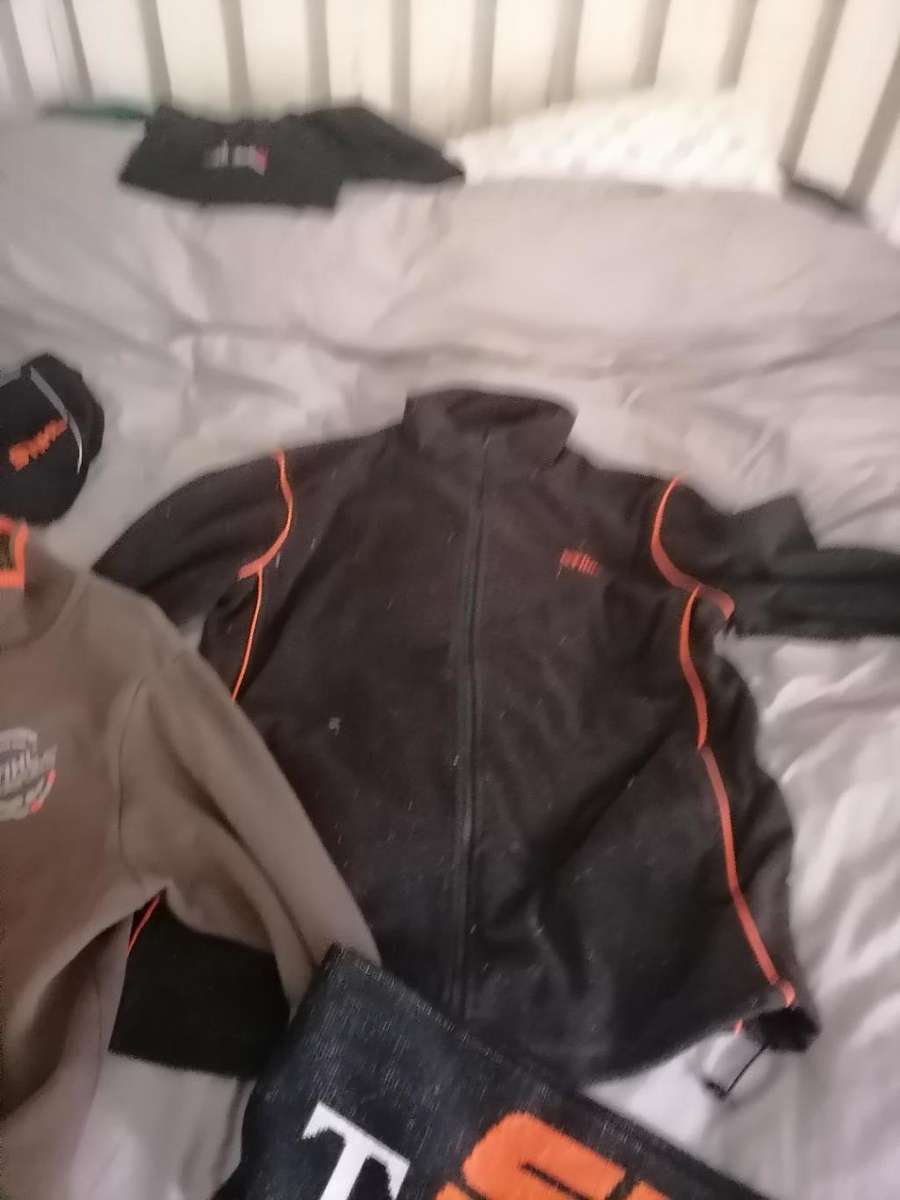 **STORAGE CLEARANCE*LOT OF STIHL JERSEYS,CAP,SCARF*SIZE LARGE**ONE BID FOR THE LOT**