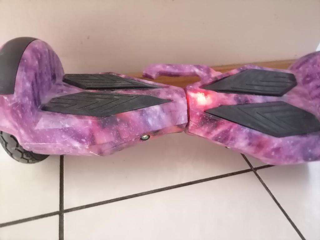 8` SMART BALANCE BOARD, NO CHARGER, POWERS ON, NOT MOVING CORRECTLY