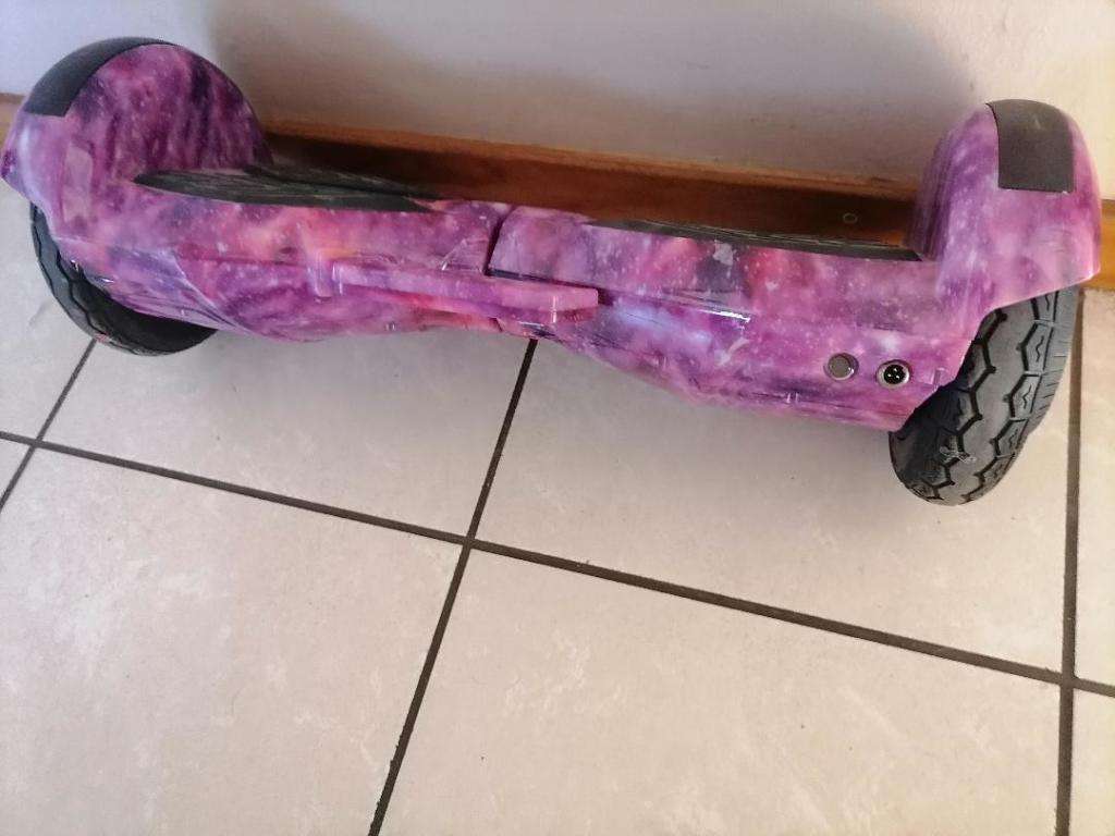 8` SMART BALANCE BOARD, NO CHARGER, POWERS ON, NOT MOVING CORRECTLY