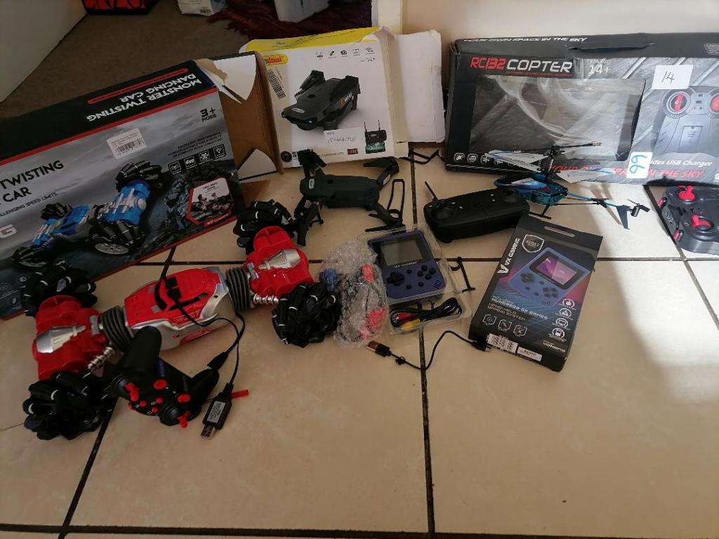 BULK LOT OF TOYS, DRONE,REMOTE HELICOPTER,OFF ROAD RC CAR,CAMING CONSOL,UNTESTED LOT,ONE BID FOR LOT