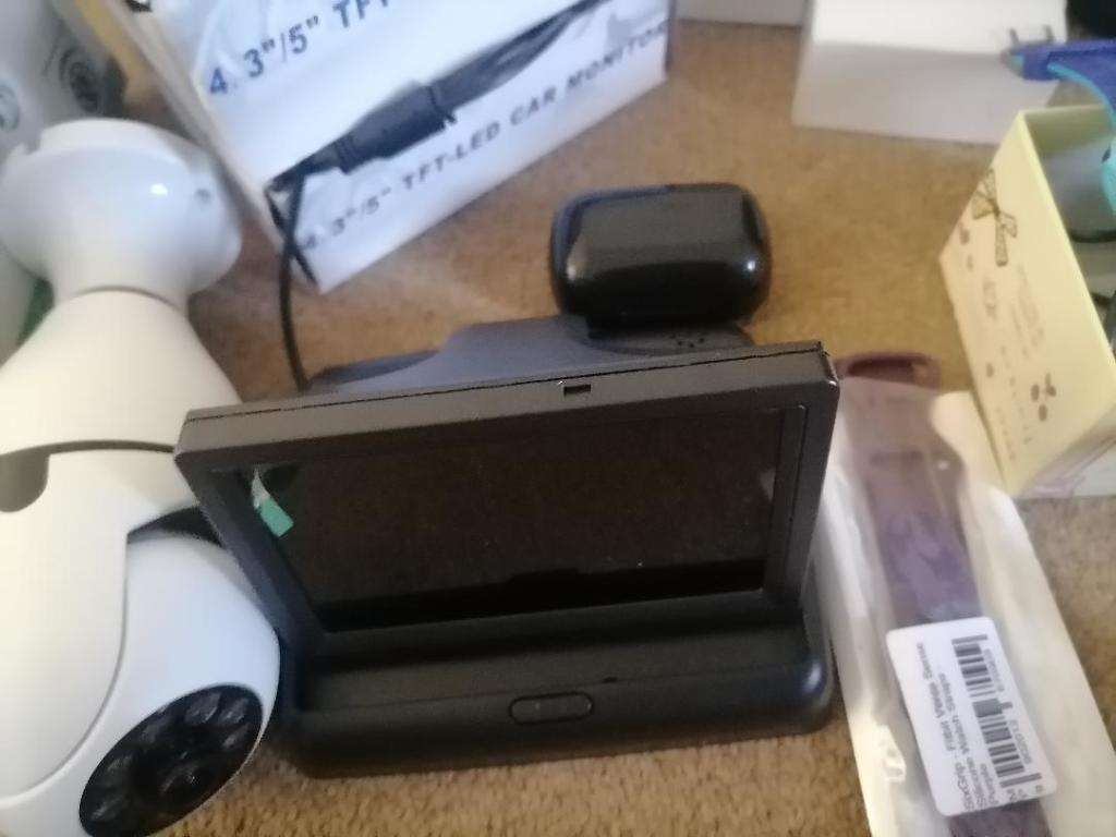 BULK LOT OF UNTESTED ITEMS,CAR LCD SCREE,PS4 HEADSET,AIR PODS,BT SPEAKER,SMART WATCH,CCTV CAMERA