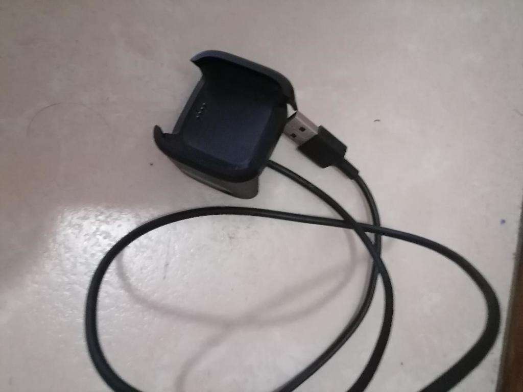 2 X FITBIT SMART WATCHES, ONE POWERS ON,OTHER BLANK, ONE BID FOR BOTH