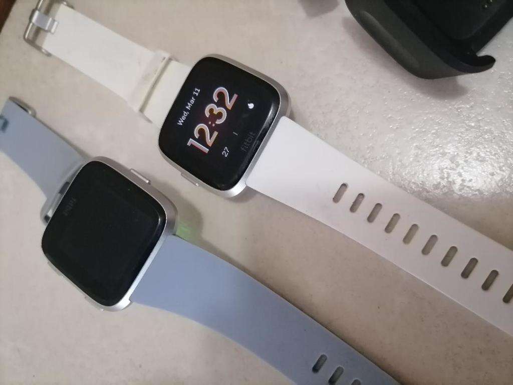 2 X FITBIT SMART WATCHES, ONE POWERS ON,OTHER BLANK, ONE BID FOR BOTH
