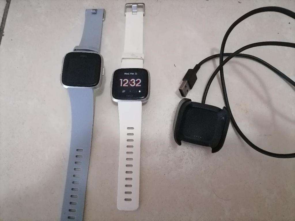 2 X FITBIT SMART WATCHES, ONE POWERS ON,OTHER BLANK, ONE BID FOR BOTH