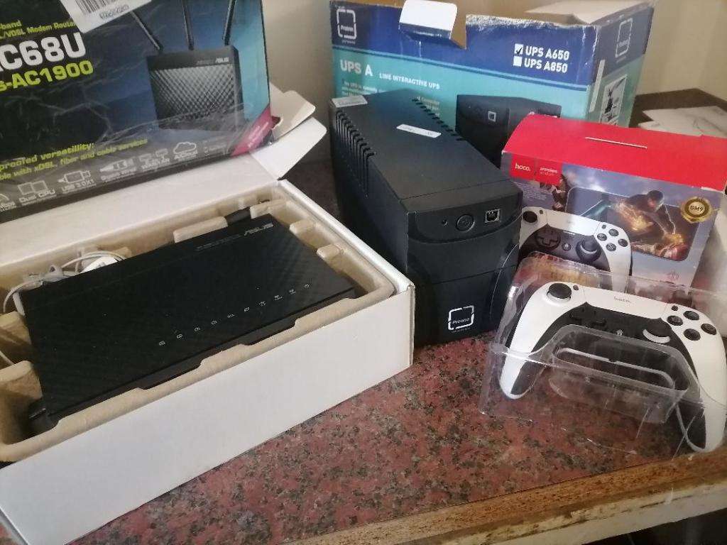 BULK LOT OF ELECTRONICS, ASUS AC1900 WIFI ROUTER,PROLINE UPS,WIRELESS CONTROLLER, ONE BID FOR LOT