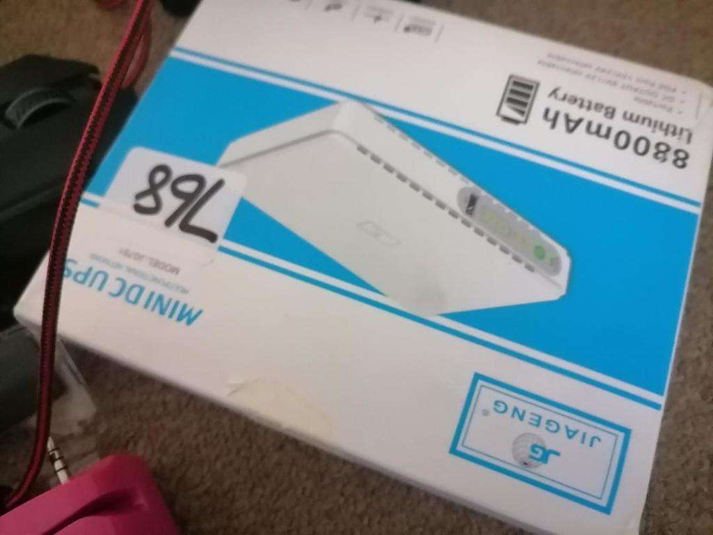 *LOT OF UNTESTED ELECTRONICS*UPS,SMART WATCH,IKHOKHAHARDSETS.ADAPTERS ETC