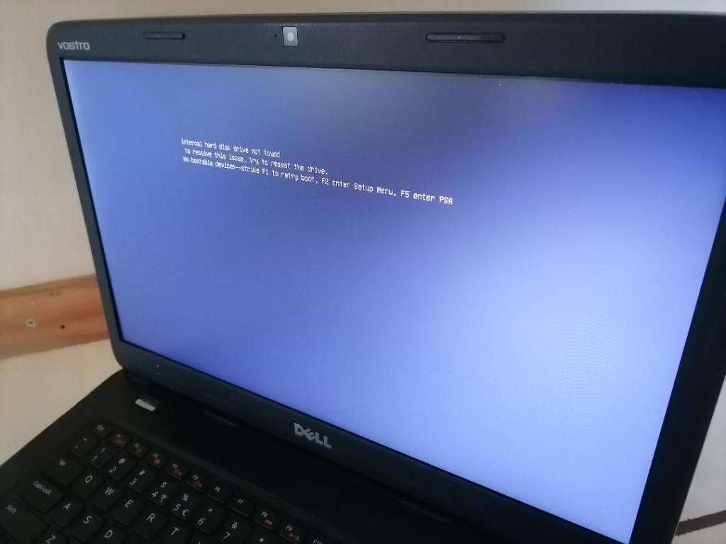 I3 DELL VOSTRO 2520 LAPTOP. POWERS ON , HARD DRIVE NOT READING